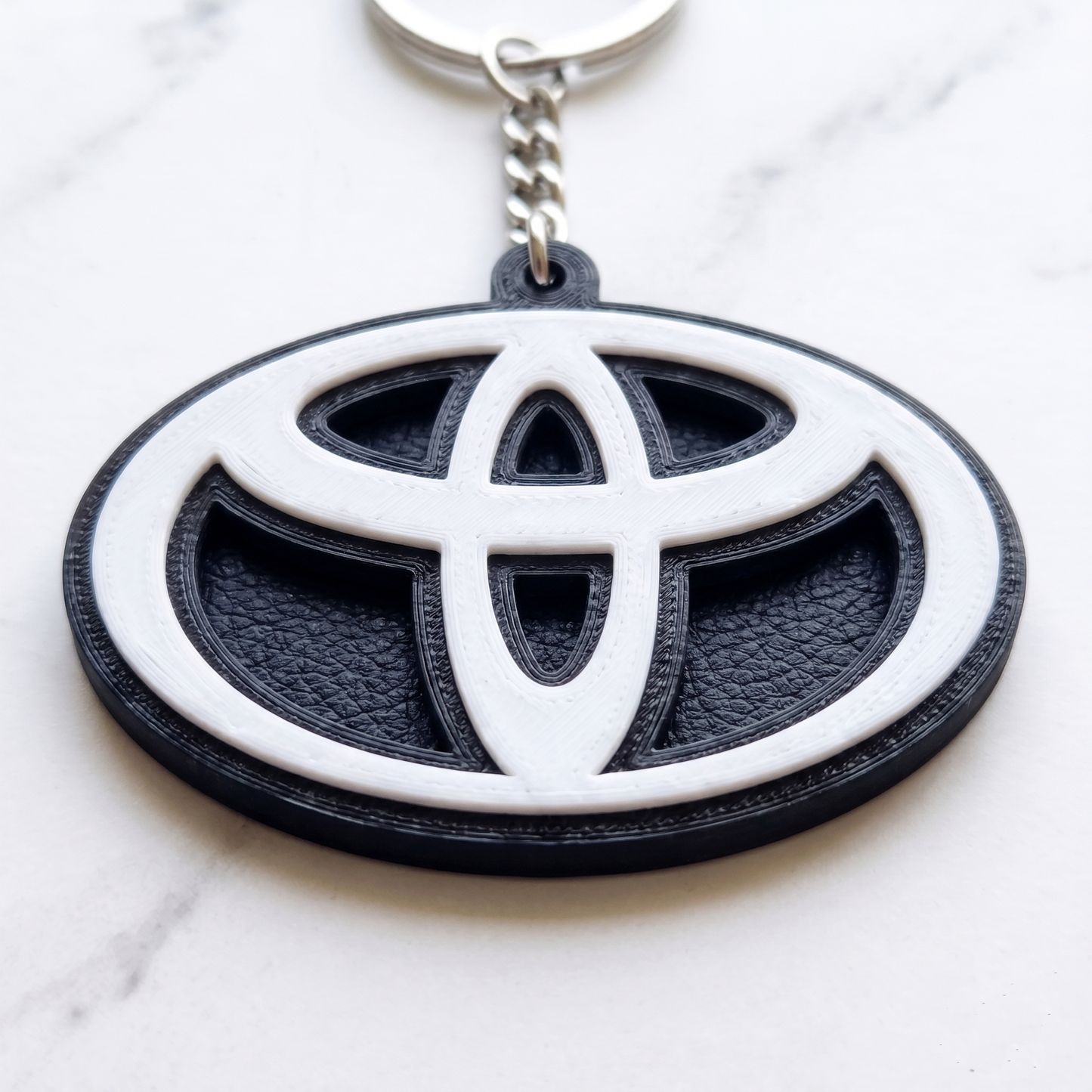 Toyota 3D Logo Keychain – Stealth White & Black Edition