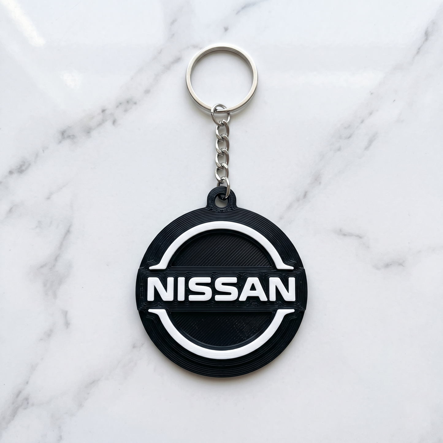 Nissan 3D Logo Keychain – Modern Stealth Edition